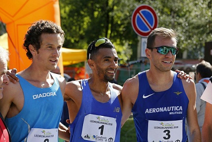 0a0Ledrorunning 2018 il podio con Marco Salami vincitore solitario davanti aFabiano Carozza Aeronautica Militare e al piemontese Stefano Guidotti Icardi Cus Torino